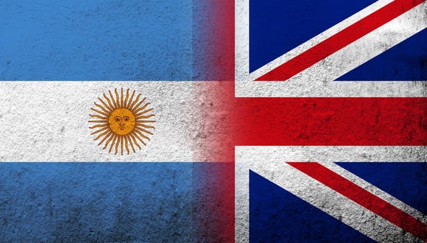 National flag of United Kingdom (Great Britain) Union Jack with National flag of Argentina. Grunge background