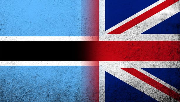 National flag of United Kingdom (Great Britain) Union Jack with The Republic of Botswana National flag. Grunge background
