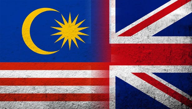 National flag of United Kingdom (Great Britain) Union Jack with National flag of Malaysia. Grunge background