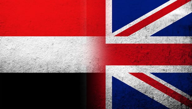 National flag of United Kingdom (Great Britain) Union Jack with National flag of Yemen. Grunge background
