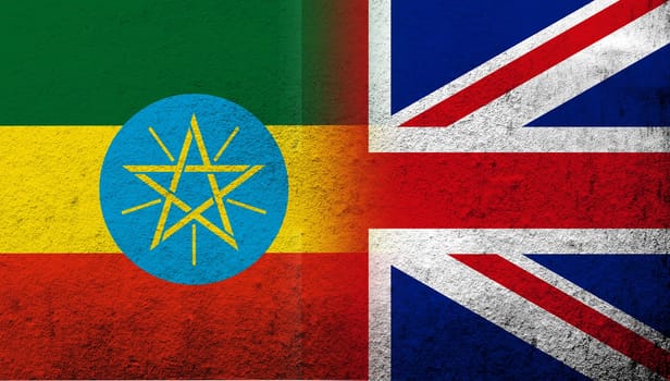 National flag of United Kingdom (Great Britain) Union Jack with Republic of Ethiopia National flag. Grunge background