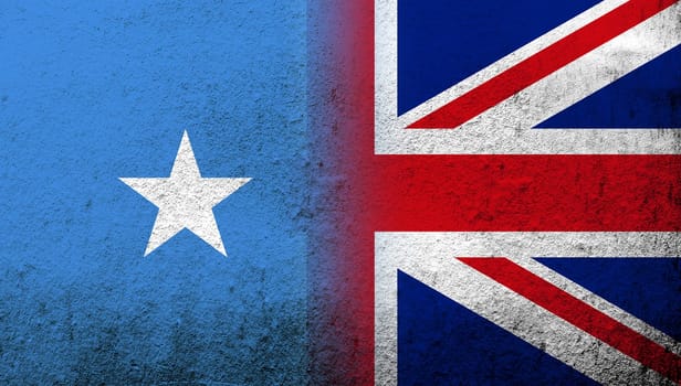 National flag of United Kingdom (Great Britain) Union Jack with Republic of Somalia National flag. Grunge background