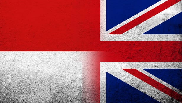 National flag of United Kingdom (Great Britain) Union Jack with The Republic of Indonesia National flag. Grunge background