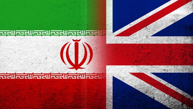 National flag of United Kingdom (Great Britain) Union Jack with The Islamic Republic of Iran (Persia) National flag. Grunge background