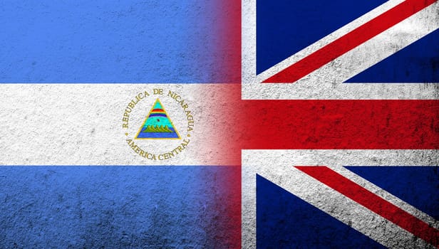 National flag of United Kingdom (Great Britain) Union Jack with The Republic of Nicaragua National flag. Grunge background