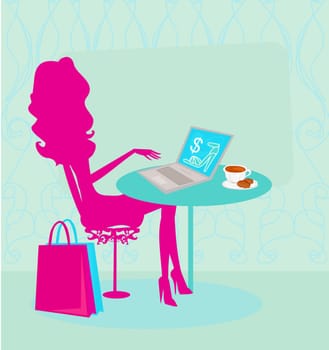 Online shopping - young smiling woman sitting with laptop comput
