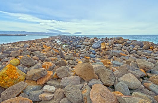 Colorful Boulders of a Breakwater on the California Coast at Morro Bay