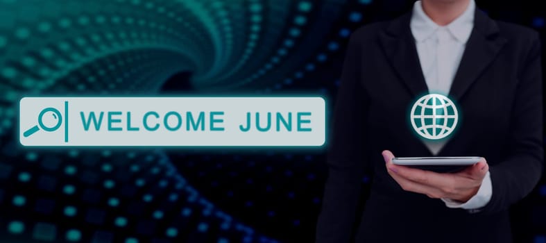 Hand writing sign Welcome June, Internet Concept Calendar Sixth Month Second Quarter Thirty days Greetings Lady in suit holding pen symbolizing successful teamwork accomplishments.