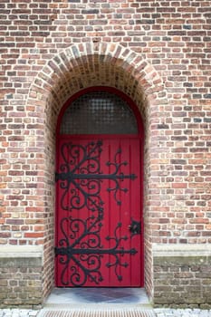 Old wooden house door in German small town, Issum, North-Rhine Westphalia, Germany