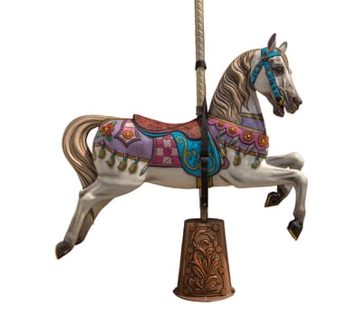 an old wooden carousel horse isolated on white background