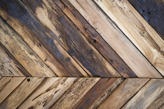 A texture of wooden boards arranged at an angle to each other.