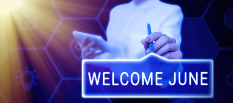 Text showing inspiration Welcome June, Word Written on Calendar Sixth Month Second Quarter Thirty days Greetings Businessman in suit holding open palm symbolizing successful teamwork.