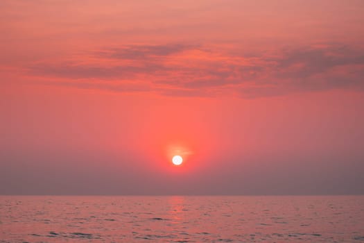 Sundown Above Sea Horizon At Sunset. Natural Sunrise Sky Warm Colors Over Ocean. Sun Over Sea Waters.