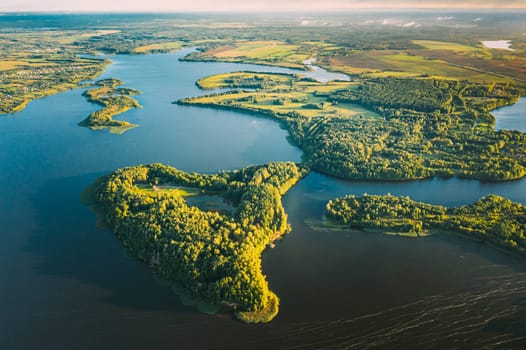 Lyepyel, Lepel Lake, Beloozerny District, Vitebsk Region. Aerial View Of Island Pension Lode In Autumn Morning. Morning Fog Above Lepel Lake. Top View Of European Nature From High Attitude In Autumn. Bird's Eye View.