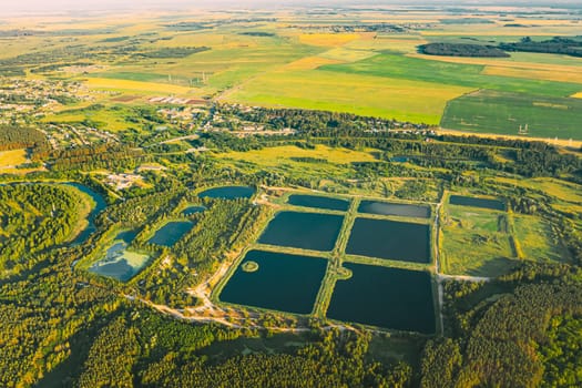 Aerial View Retention Basins, Wet Pond, Wet Detention Basin Or Stormwater Management Pond, Is An Artificial Pond With Vegetation Around The Perimeter, And Includes A Permanent Pool Of Water In Its Design.
