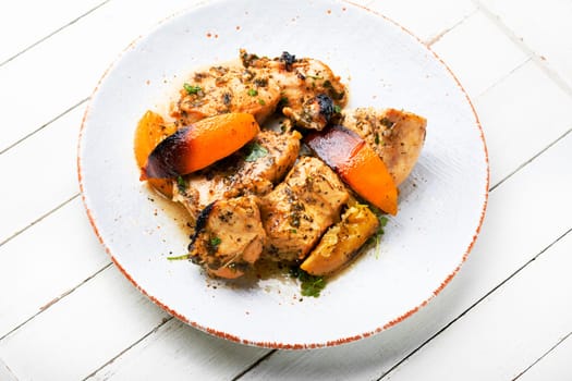 Chicken breast baked in orange sauce. Food for Christmas.