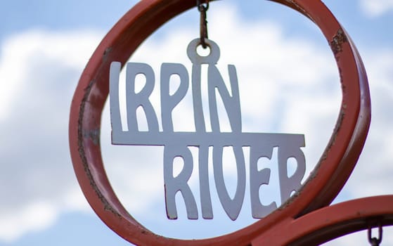 Irpin is a Ukrainian city in the suburbs of Kyiv. Located on the Irpin River. Hero City of Ukraine. Text: Irpin River. Ukraine, Irpin - May 24, 2022