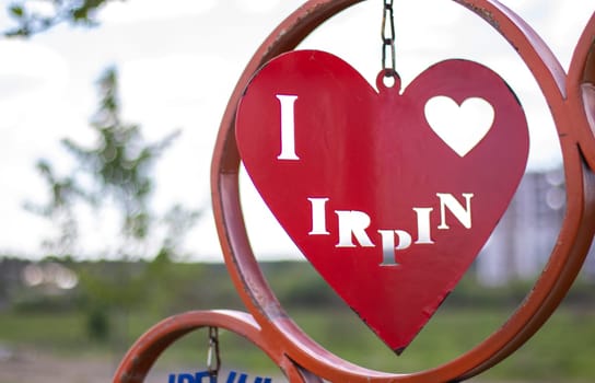 Irpin is a Ukrainian city in the suburbs of Kyiv. Located on the Irpin River. Center of the Irpin community of the Buchansky district. Hero City of Ukraine. Text: I love Irpin