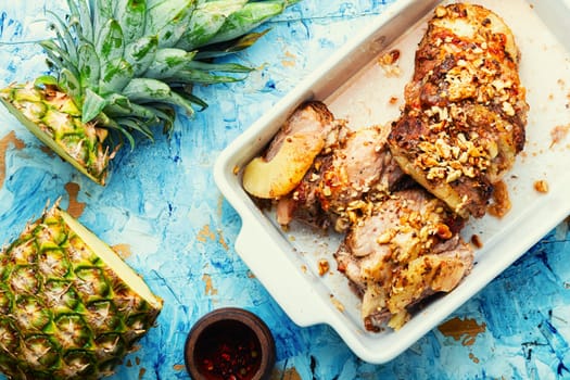 Pork meat baked with pineapple and cheese