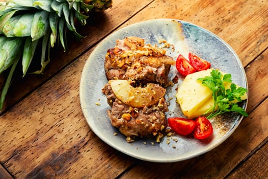 Meat stewed with pineapple