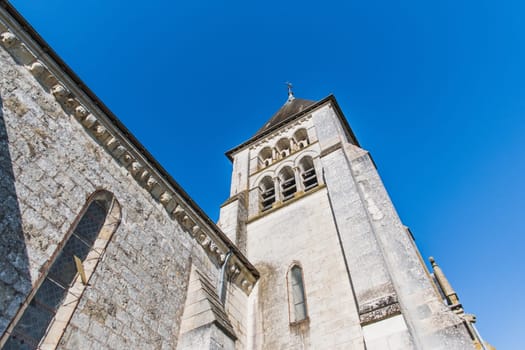 Church of Saint Hilaire de Châteauvieux under a blue sky in Châteauvieux in the Loir-et-Cher