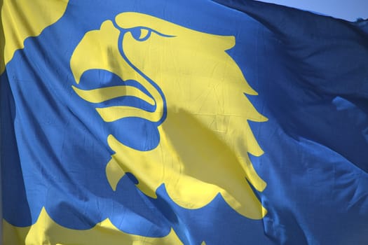 The blue and yellow flag of the Swedish Coast Guard,Kustbevakningen,with the yellow eagle's head. The Coast Guard is also responsible for border protection of the Swedish territory at its sea border