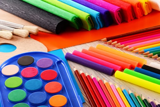 Composition with school accessories for painting and drawing.