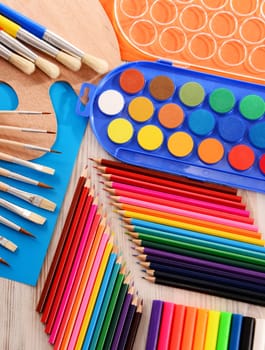 Composition with school accessories for painting and drawing.