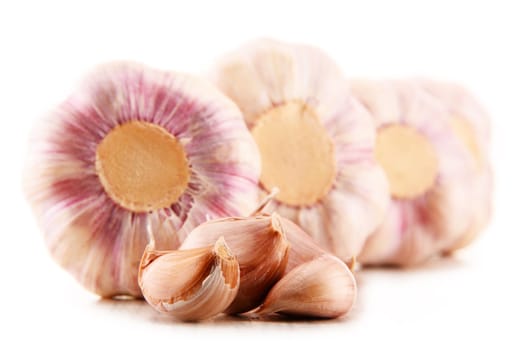 Composition with bulbs of garlic isolated on white background