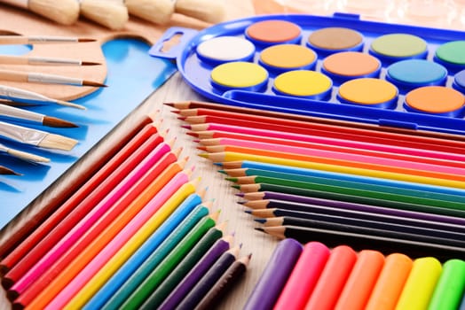 Composition with school accessories for painting and drawing.