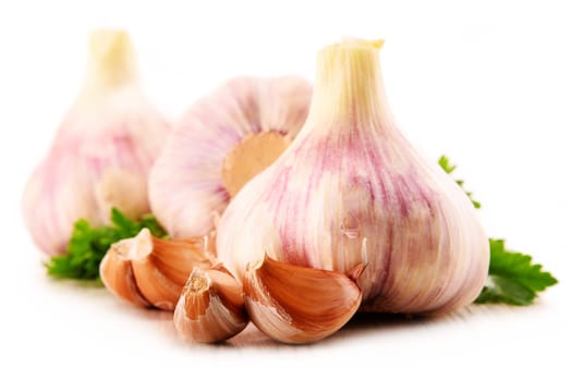 Composition with bulbs of garlic isolated on white background