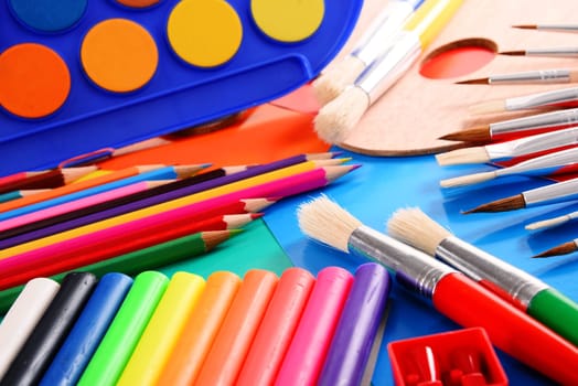 Composition with school accessories for painting and drawing.