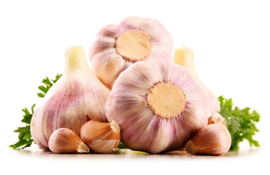 Composition with bulbs of garlic isolated on white background