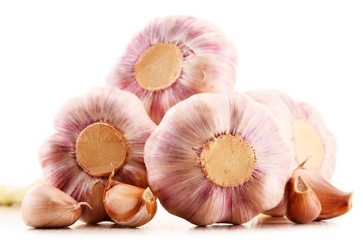Composition with bulbs of garlic isolated on white background