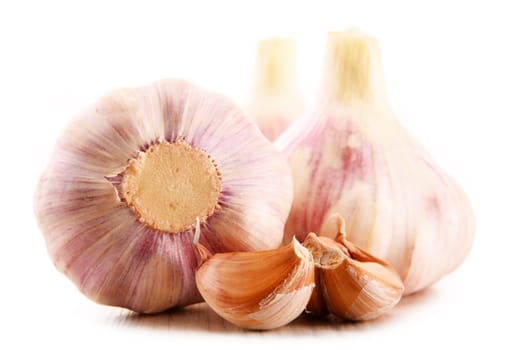 Composition with bulbs of garlic isolated on white background