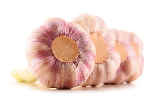 Composition with bulbs of garlic isolated on white background