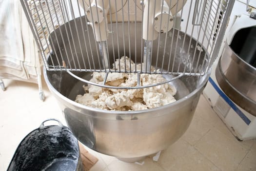 Food processor to kneading dough for bread. Manufacturing process of spanish bread