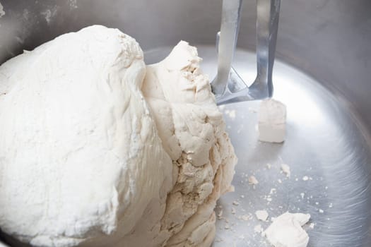 Food processor to kneading dough for bread. Manufacturing process of spanish bread
