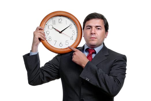 A handsome business man holding a clock