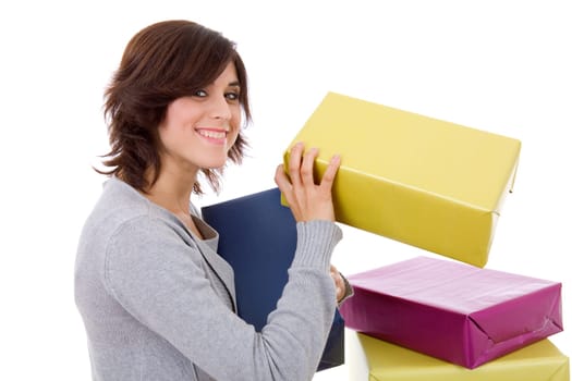 young shopaholic woman with lots of gifts, on white