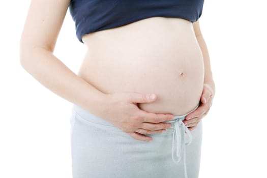 Closeup of pregnant woman at white background