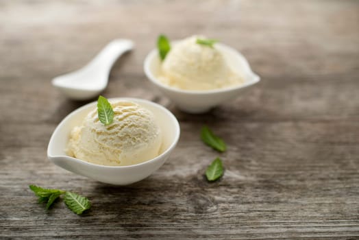 Ice cream on a wooden background close up