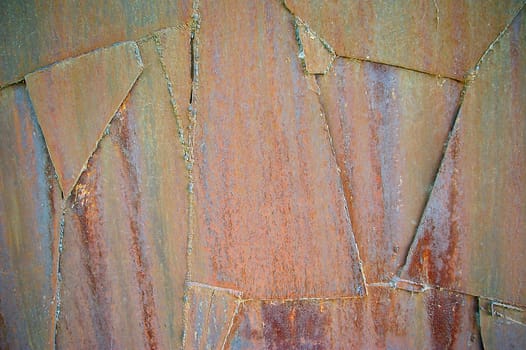 Rusty vintage colored grunge iron textured background