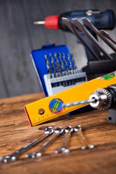 Working tools on wooden background