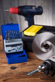 Working tools on wooden background