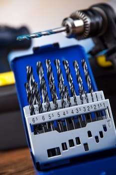 Working tools on wooden background