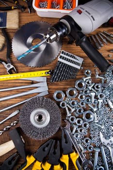 Working tools on wooden background