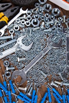 Working tools on wooden background