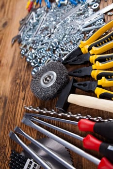 Working tools on wooden background