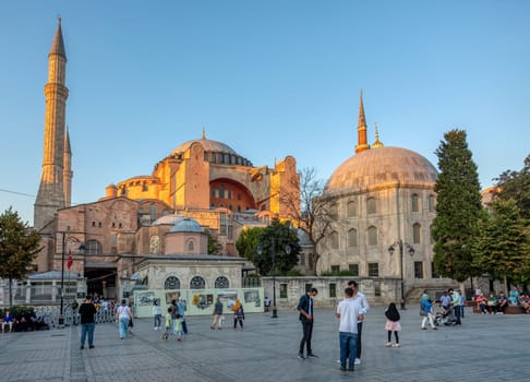 Istanbul, Turkey - August 5, 2022: People behind Hagia Sophia Camii mosque or Ayasofya (Turkish), Istanbul, Turkey.